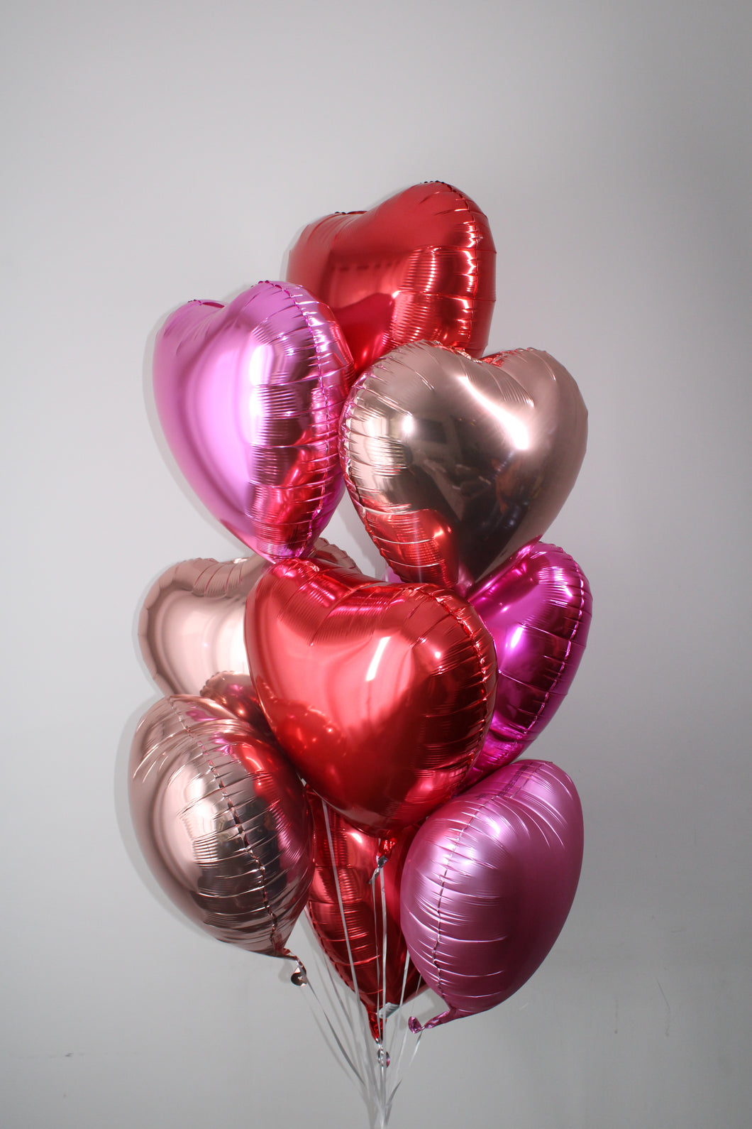 LARGE LUXE BALLOON BOUQUET: ROSE GOLD, RED, FUSCHIA
